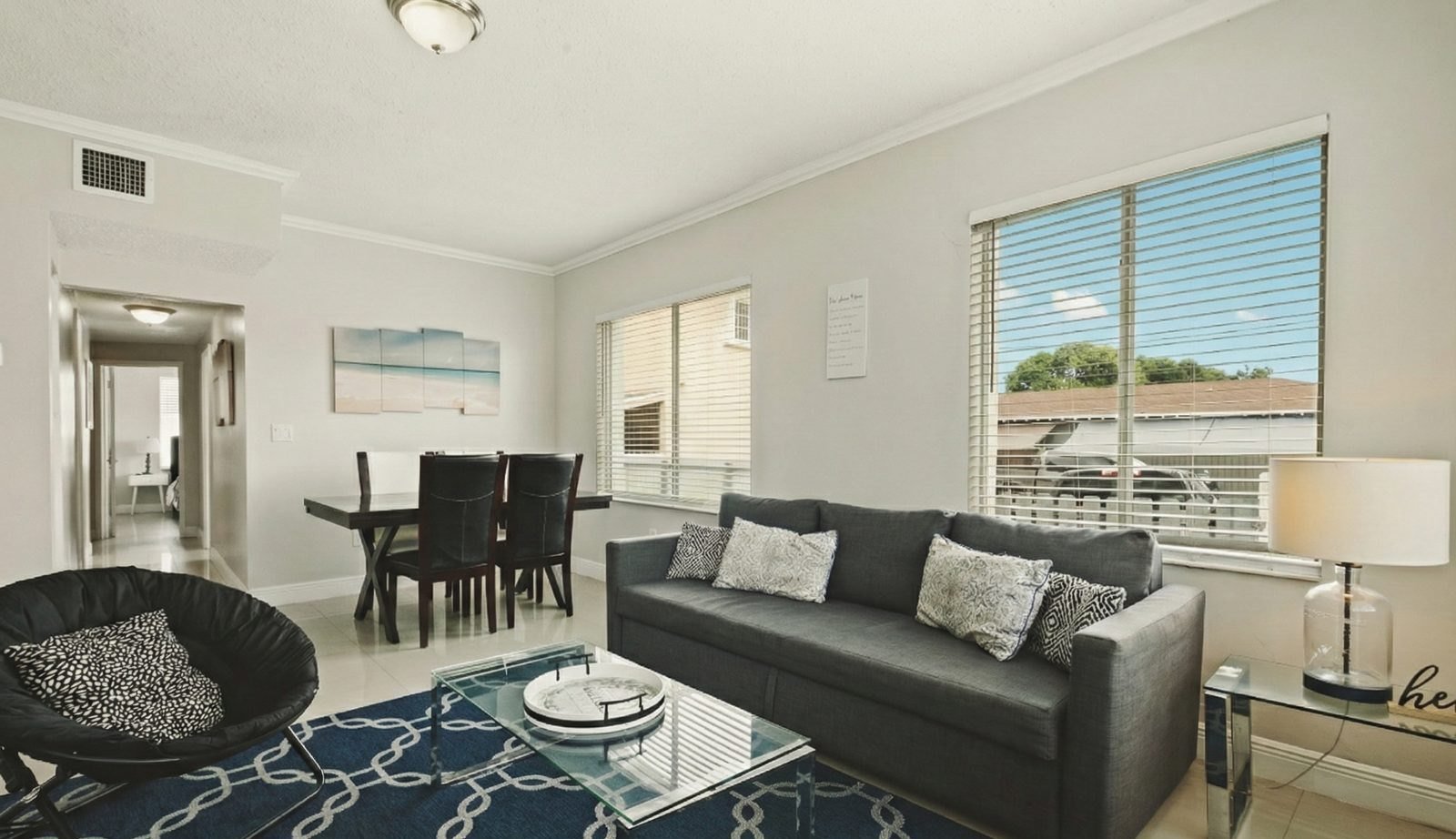 Living room of the Gallo Suite, a furnished 2-bedroom apartment near loanDepot Park in Miami